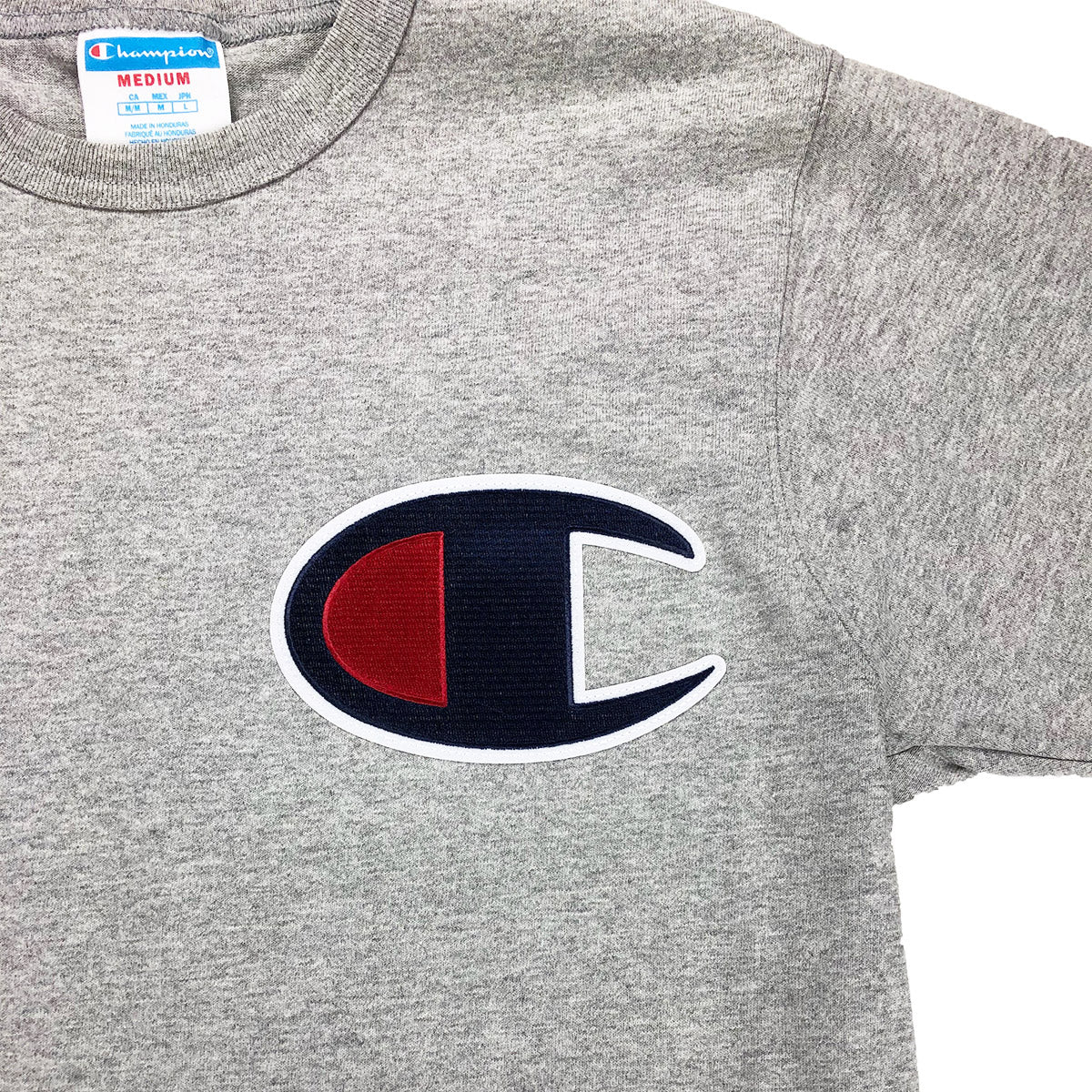 champion patch shirt