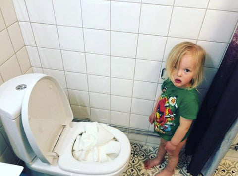 Toddler with Toilet Paper
