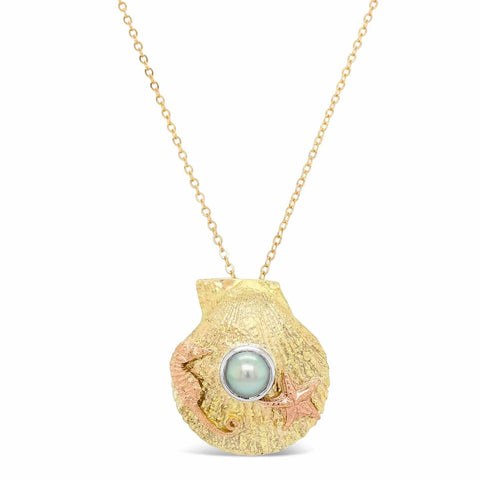 pearl with gold pendant