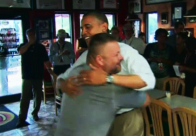 unknown man hugging barack obama