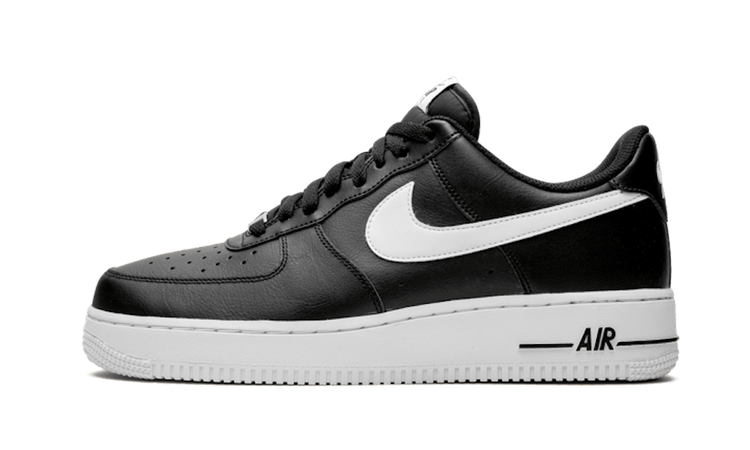nike white sneakers with black swoosh