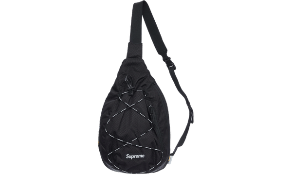 supreme sling bag on person