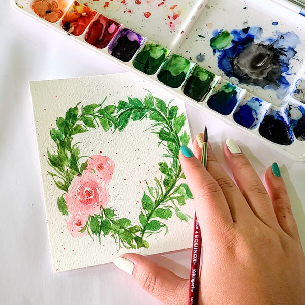 Watercolor wreath hand painted by artist Angie Daly