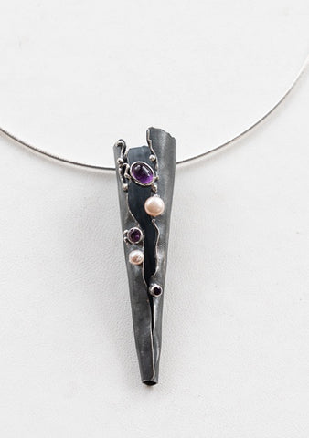 Sterling silver and Amethyst pendant, based on a small fungus found in the Enchanted Walk at Cradle Mountain Tasmania