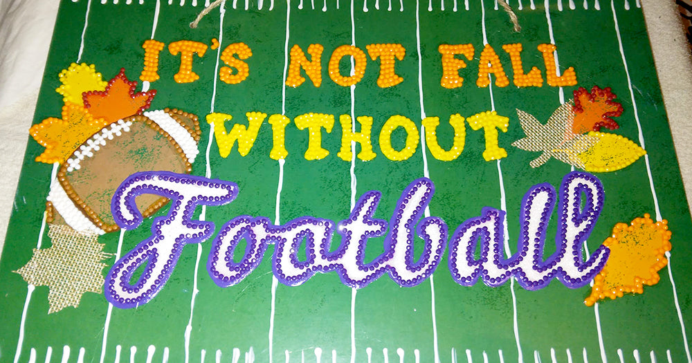 A Picture of a Football Field with the Text "It's Not Fall Without Football" 