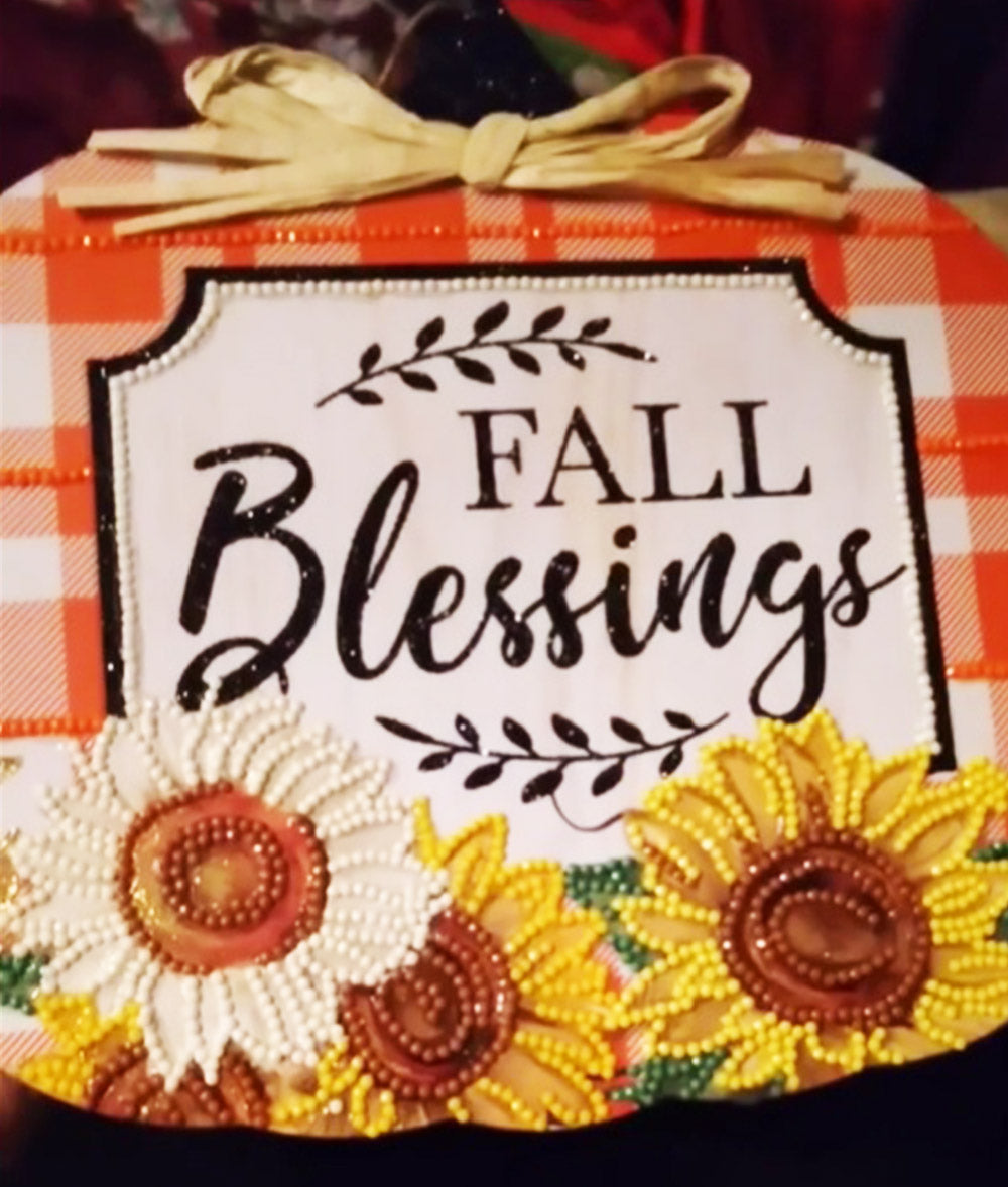 A Sign That Says "Fall Blessing" with Sunflowers