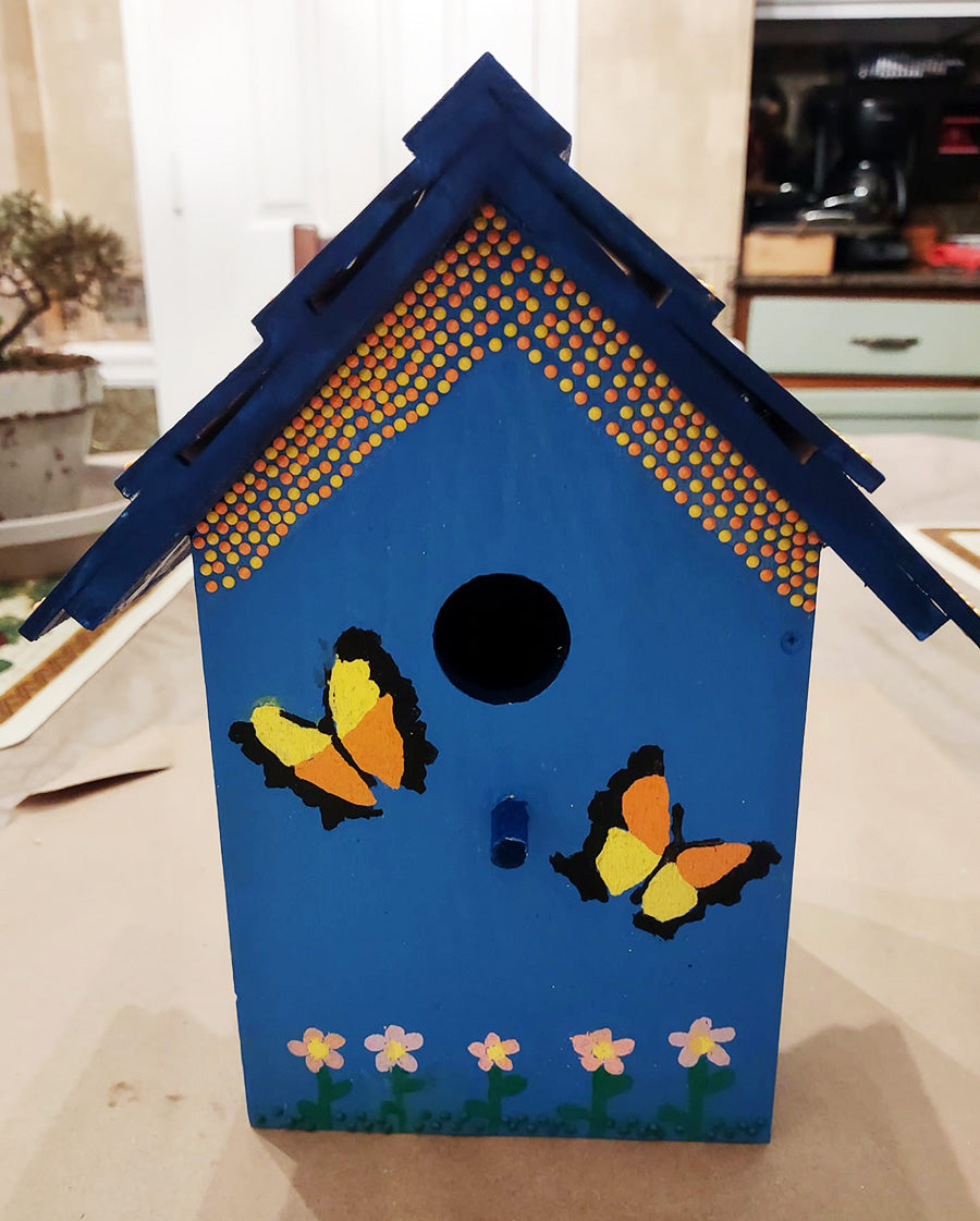 Blue Birdhouse with painted flowers and gems 