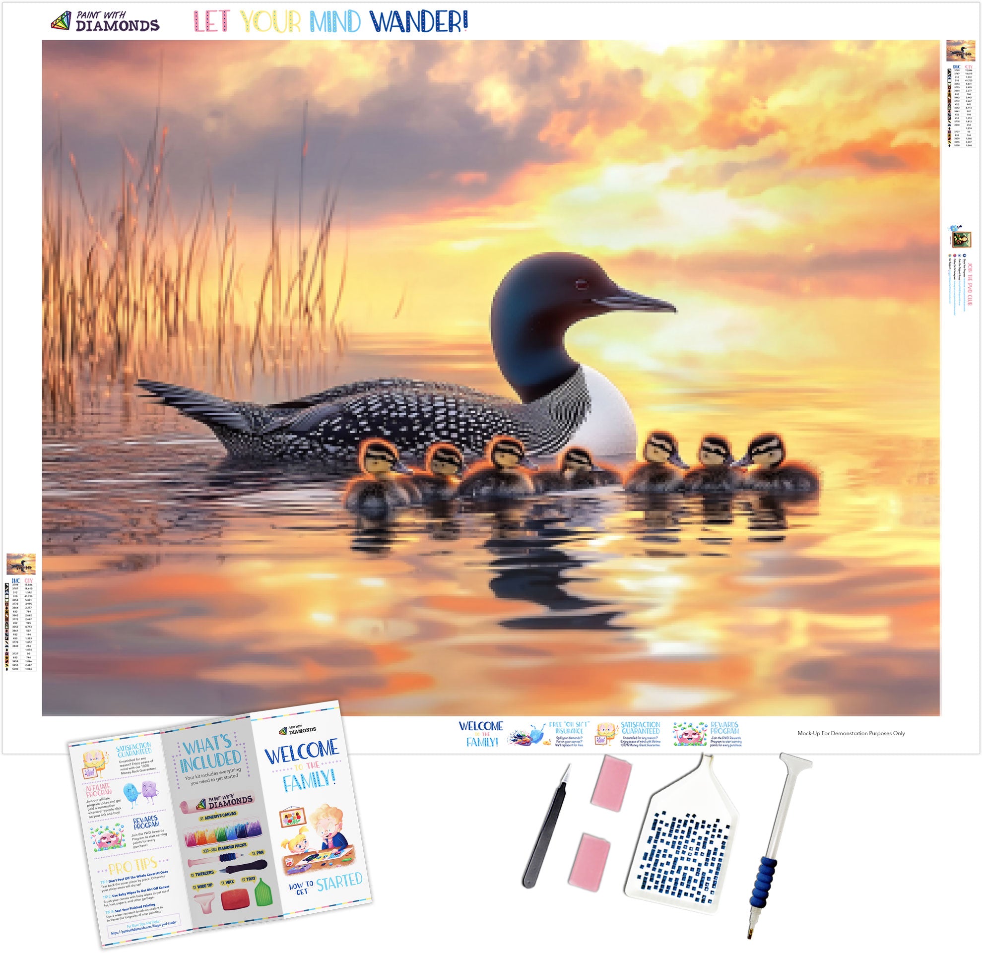 Loon and Ducklings on a Sunset Lake