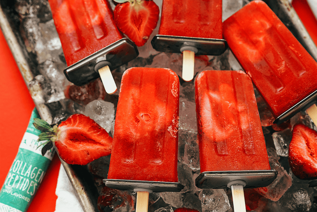 A tray of strawberry orange collagen pops made with Primal Kitchen Collagen Peptides