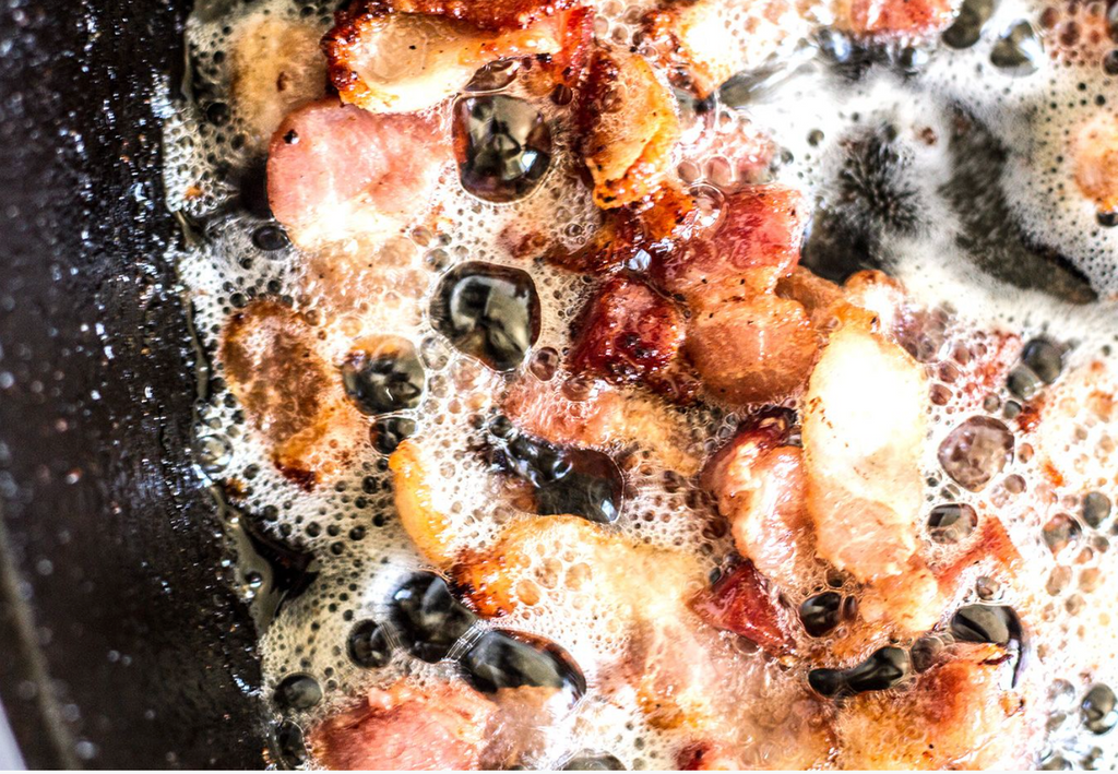 frying bacon in a cast iron pan