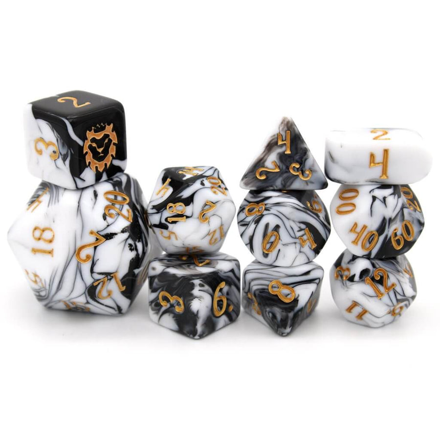 The DLucks 10-piece unique dice set by Dice Envy, featuring black and white swirled acrylic reminiscent of fine marble, and gold numbering.