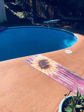 Yoga mat by the pool