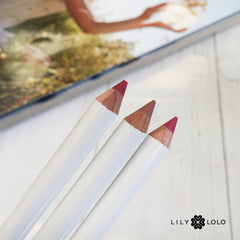 Three Lily Lolo lip liner pencils on a white tray, with Lily Lolo logo on bottom right