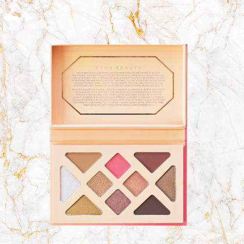 Image of Athr Beauty Desert Sunset eyeshadow palette on a marble background with gold lines on well&belle