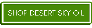 Green button with text: Shop Desert Sky Oil