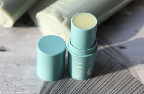 Image of opened Taos Aer Organic lip balm on well&belle