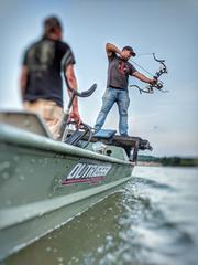 bowfishing boat with bright swamp eye lights