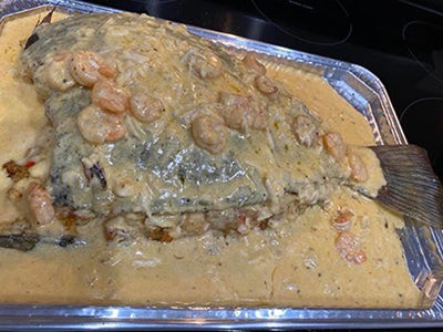 whole baked stuffed flounder with sauce