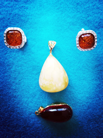 Face made of Amber cufflinks and amber pendants