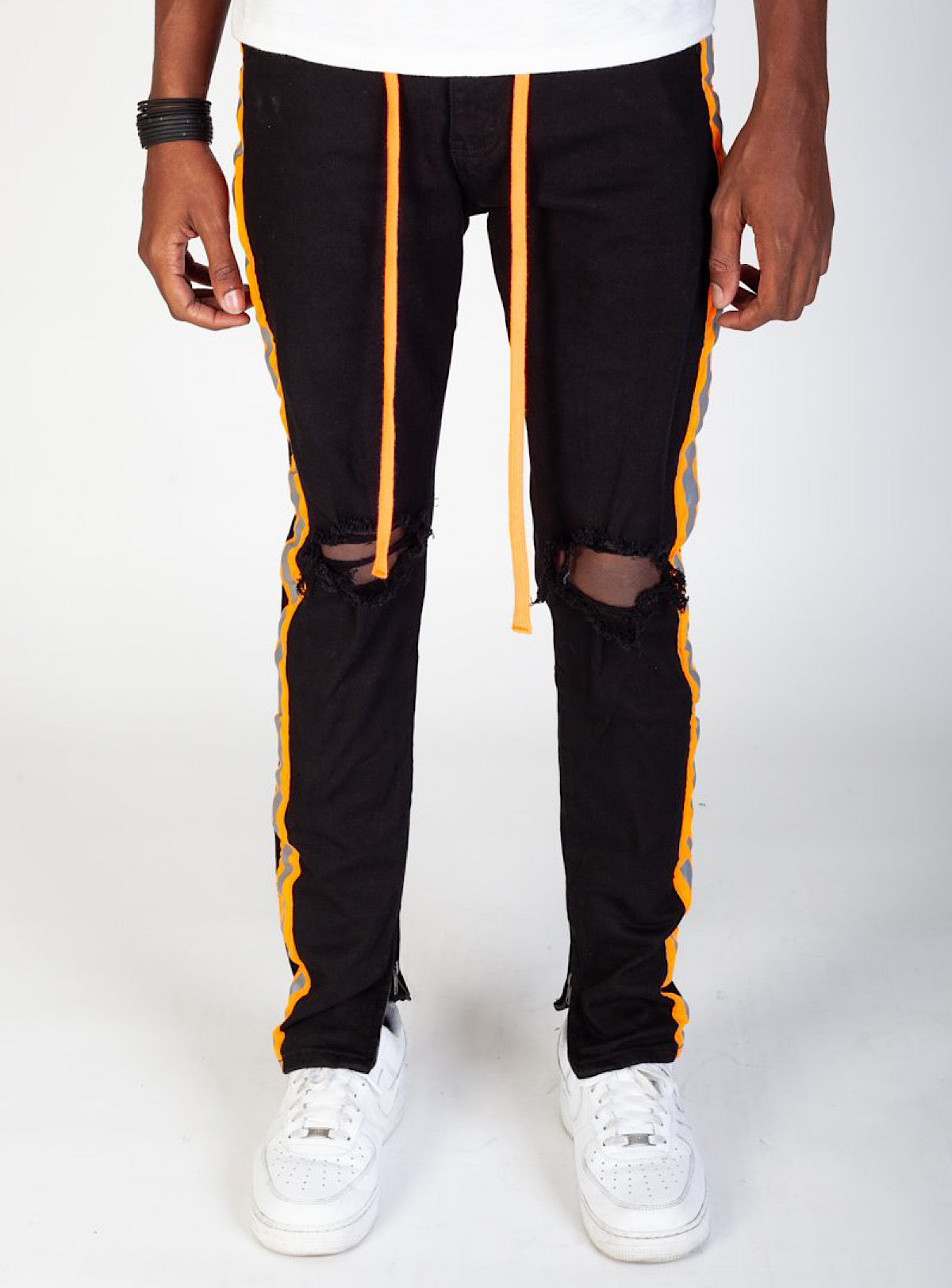 black jeans with orange stripe