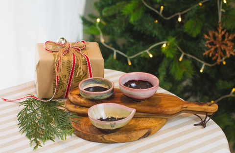 Condiment Bowls On A Chopping Board