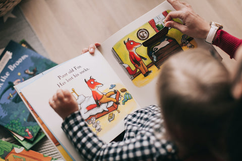 kid reading a book