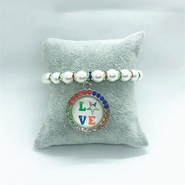 OES Bracelet - White Beads With Charm