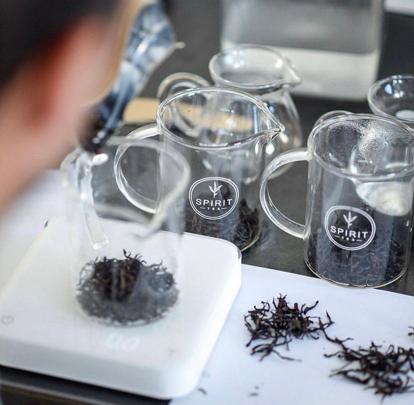 Weighing dry tea leaves on a Pearl scale