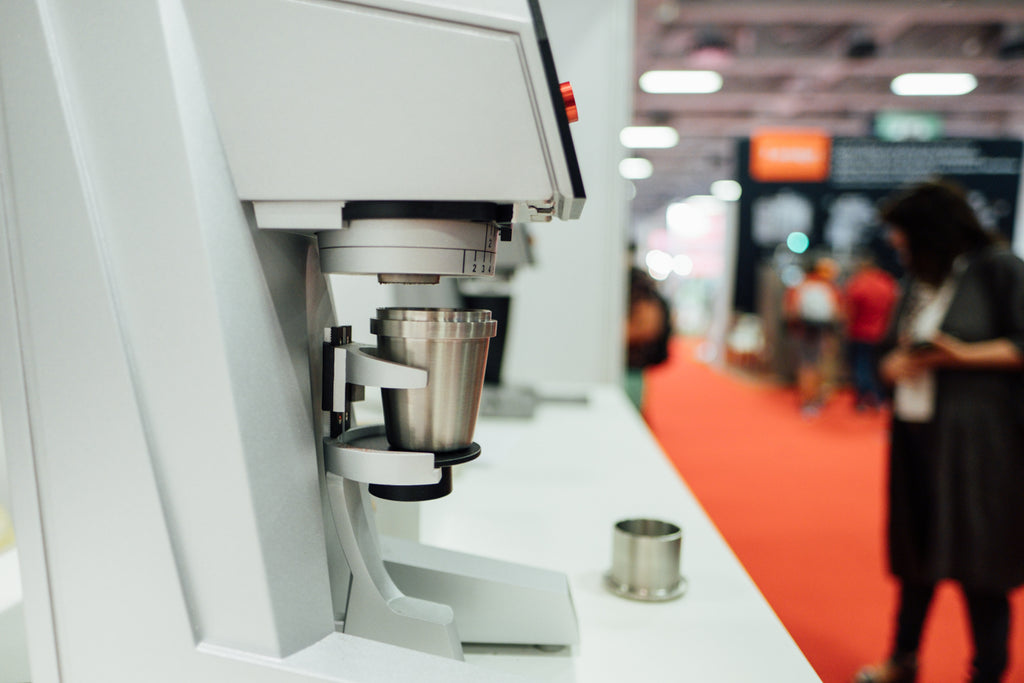 An Acaia Dosing Cup S on a Etzinger grinder