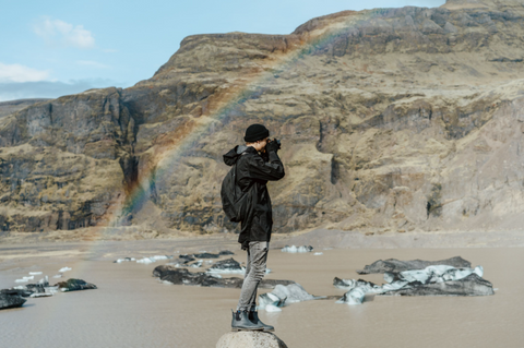 Xavier in Iceland in his Merry People boots