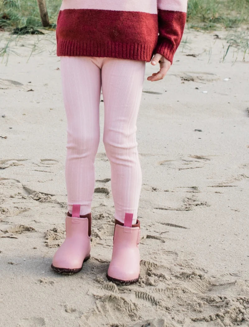 dusty pink boots on a kid