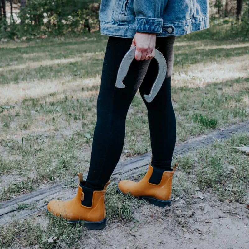 horse shoe and mustard boots