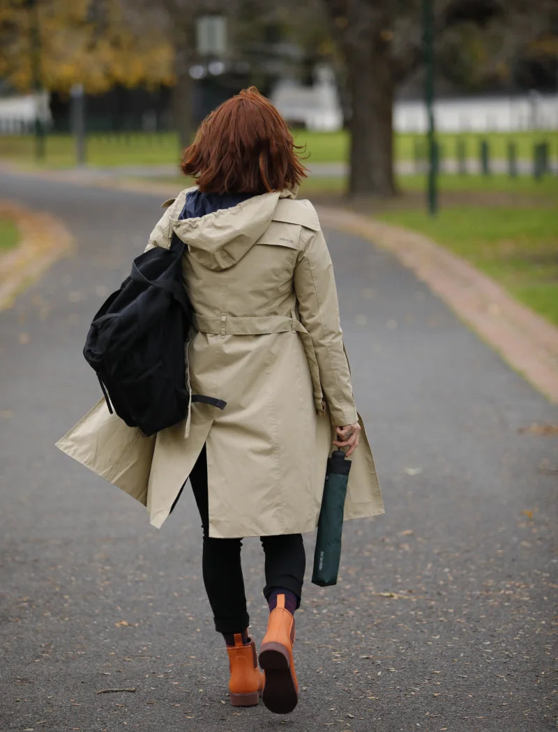 orange boots and trenches