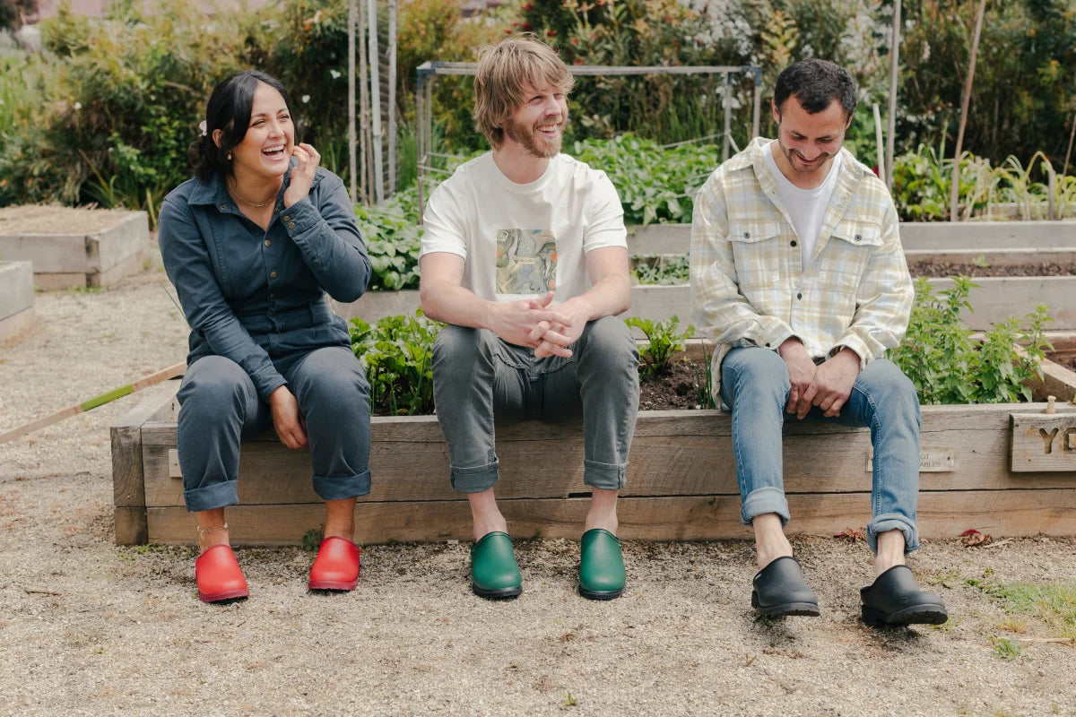 people wearing clogs in the garden
