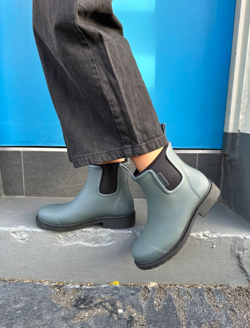 slate grey boots  and black jeans