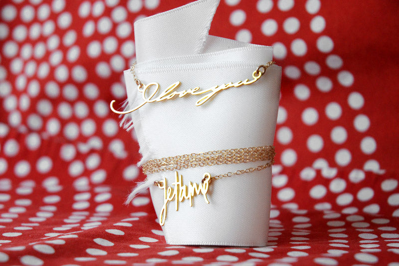 gold dipped custom signature handwriting necklace as a gift for Valentine's Day.