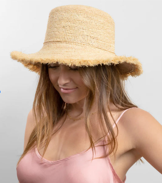 Raffia bucket gives off summer vibes.