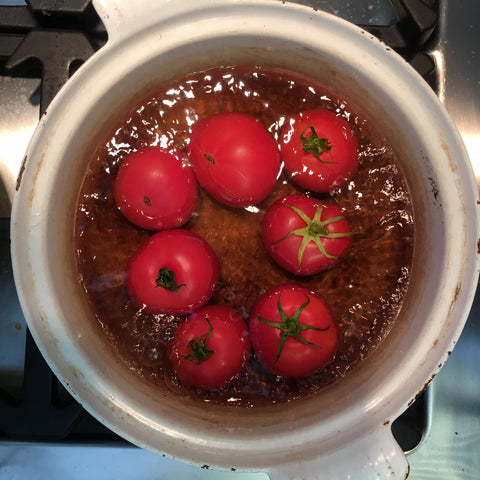 peeling tomatoes