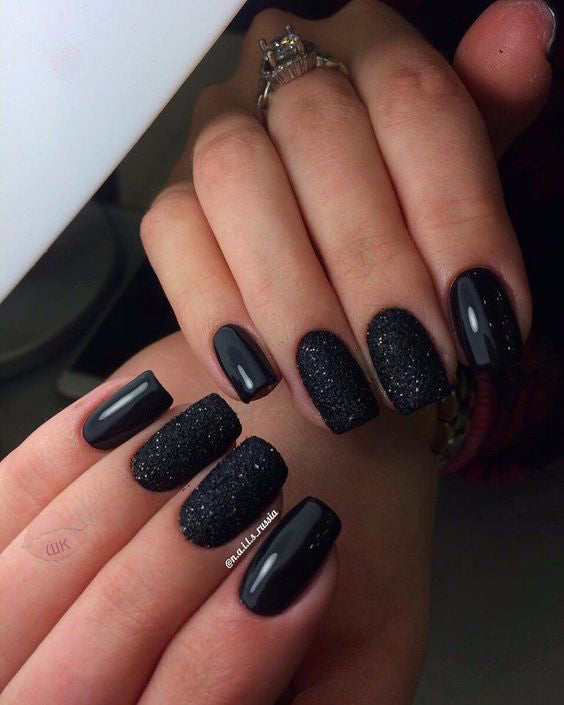 99+ Trending Black Nails Art Manicure Ideas; Black coffin nails; Black acrylic nails; long Black gel nail; short Black nails; Black cute nails; Black matte nails; Black glitter nails.