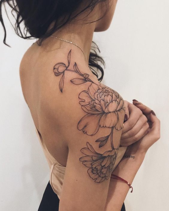 24 Celebrities With Flower Tattoos