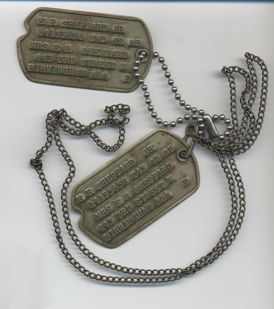 In what year did they start using the first dog tags