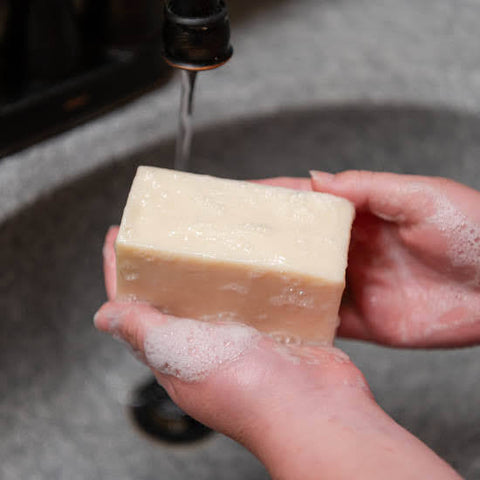 Washing hands with Purity Goat Milk Soap