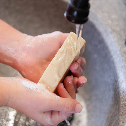 Washing hands with Purity Goat Milk Soap