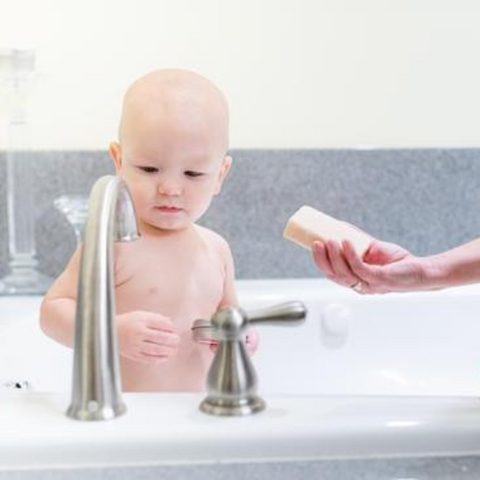 Michael in bathtub with Purity Goat Milk Soap