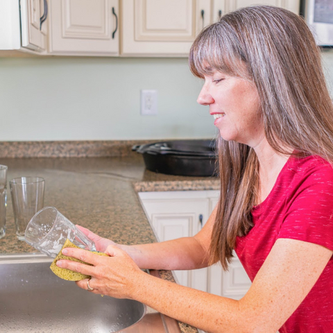 PJ washing dishes with Dish Washing Goat Milk Soap