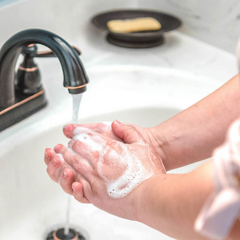 Washing hands with Lemongrass Goat Milk Soap