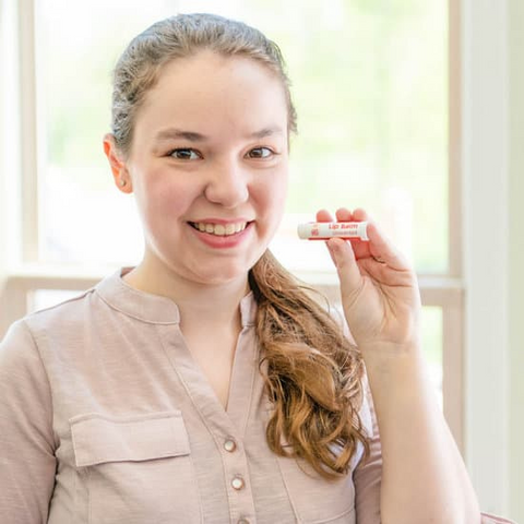 Brett holding Unscented Goat Milk Lip Balm