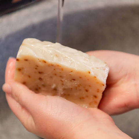 Washing hands with Peppermint Goat Milk Soap