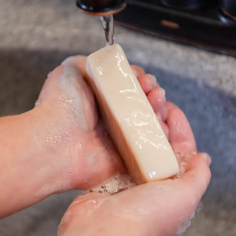 Washing hands with Purity Goat Milk Soap