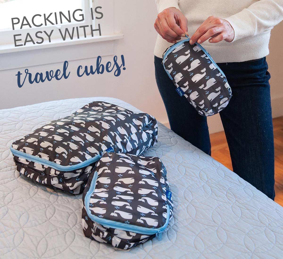 three travel cubes in a whale print make packing easy
